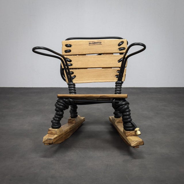 A unique rocking chair designed by dutch designer sander bokkinga for bok in the 2020s. Combining natural oak with...