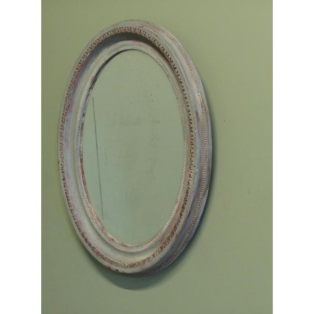 Victorian Overpainted Oval Wall Mirror This Mirror has a 3" wide moulded oval frame which has been overpainted in soft...