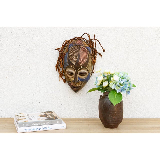 This captivating Chokwe mask from Angola, the Democratic Republic of Congo, or Zambia, is a beautiful example of African...