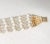 This is part of Chairish’s Costume Jewelry assortment. 1950s goldtone 5-strand round faux-moonstone beads and faceted...