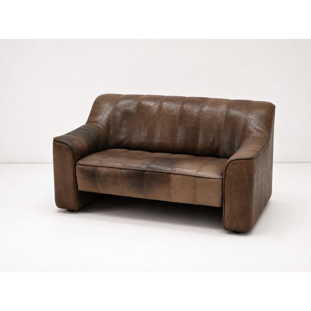 DS 44 Two-Seater Sofa in Buffalo Brown Leather from de Sede, 1970s, in Good conditions. Designed 1970 to 1979 I have...
