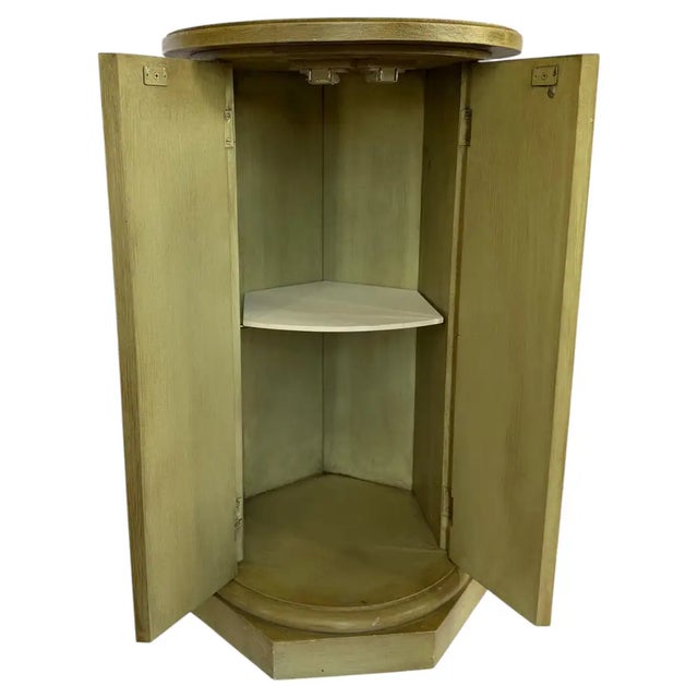 Vintage Neoclassical‑style fluted column pedestal side table featuring a muted olive‑green distressed finish and a...