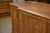 A superb antique oak counter, typical of early 20th-century shop and workshop design. Its large-paneled front, punctuated...