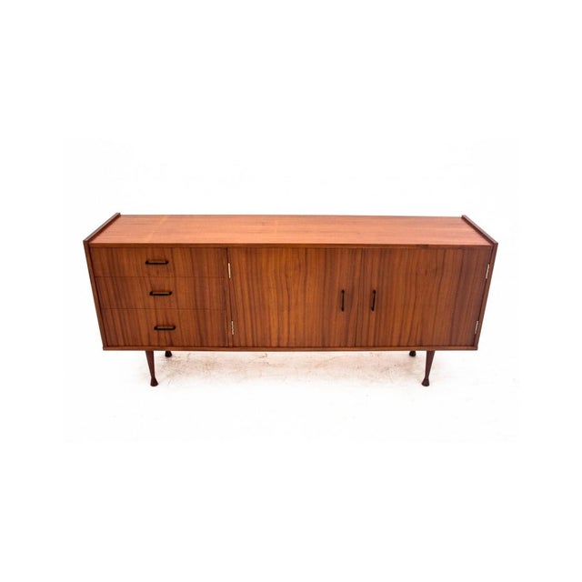 Chest of drawers manufactured by Krakow Furniture Factories from the 1960s. Chest of drawers covered entirely with...