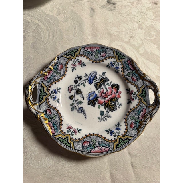 Rare. Antique Doulton (p.b.&h) Burslem Alma Salad Plate With Handles. Circa 1900. 5 available. 8.75" diameter. Some paint...