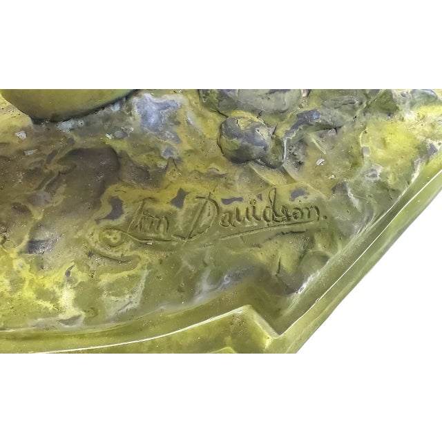 This large, well weathered bronze sculpture of a seated lady sitting on a bench is an original piece from the 1960s. The...