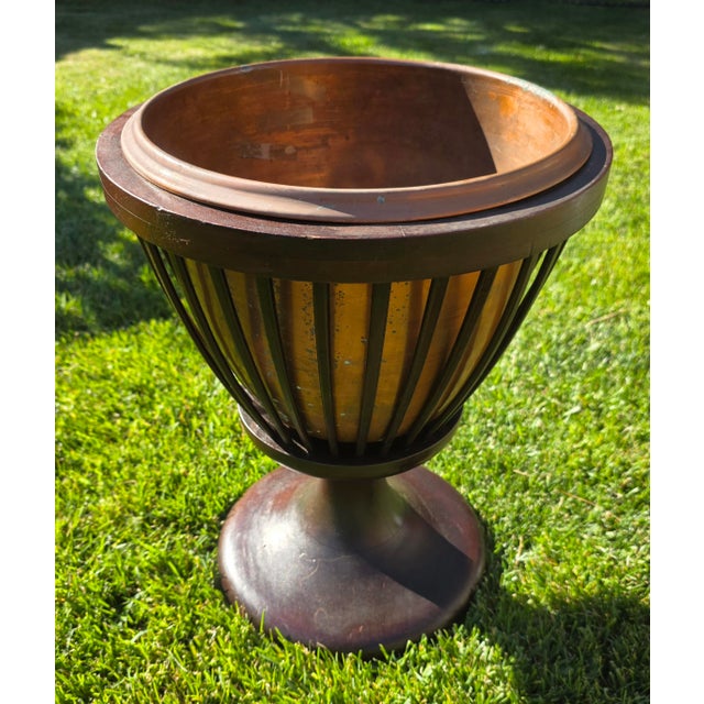 This 19th Century Slatted Inlaid Mahogany and Copper Jardinièr Planter is a traditional and decorative Antique piece. The...