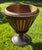 This 19th Century Slatted Inlaid Mahogany and Copper Jardinièr Planter is a traditional and decorative Antique piece. The...