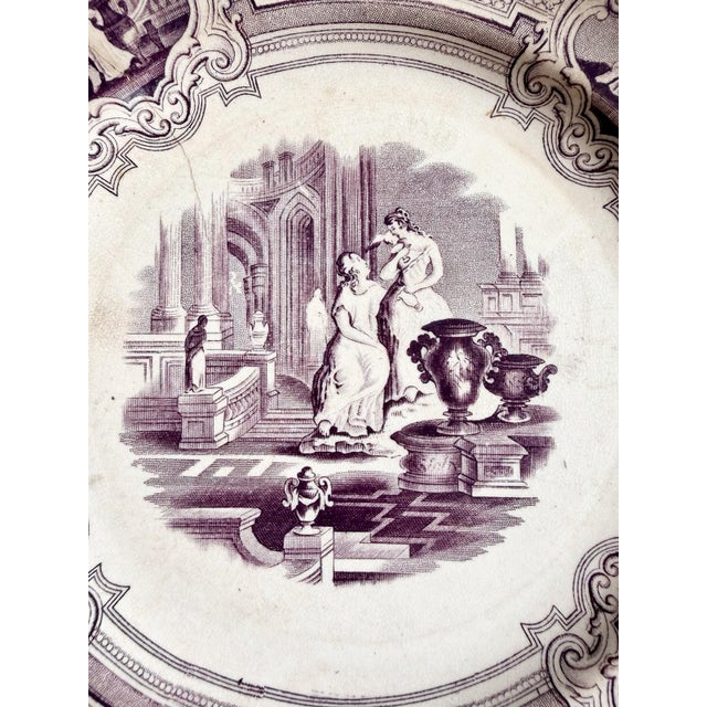 Nice antique patina, and a rare design. I couldn’t find another plate like it.