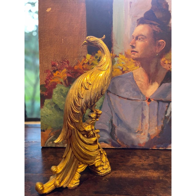 Beautiful pair of vintage Syroco molded sculptures featuring elegant pheasant/peacock figures. These pieces showcase the...