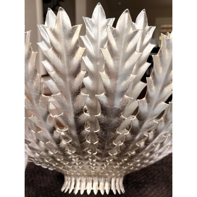 Authentic AERIN Hampton medium chandelier by Visual Comfort in the Burnished Silver Leaf finish. Sculpted metal leaves...