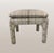 A subtle yet striking custom pair, these ottomans are newly upholstered with Larson's 'Kenya' fabric in color 'Shell.'...