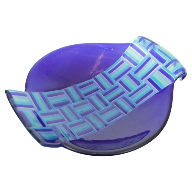 A striking vintage Postmodern fused art glass bowl, handcrafted circa 1980 in an exceptionally vibrant palette of royal...