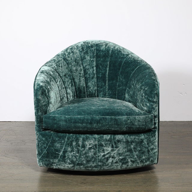 This Mid-Century Modernist swivel tilt club chair, attributed to Milo Baughman, is luxurious and functional, embodying the...