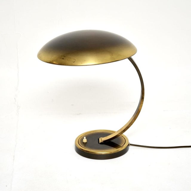 A very stylish and extremely well made vintage Bauhaus brass desk lamp by Christian Dell for Kaiser Leuchten. This was...