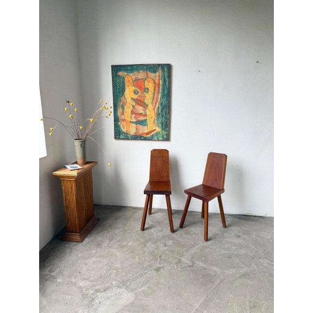 Vintage pair of solid oak chairs from the 1950s. we love their brutalist design, with the solid wood and simple shapes. in...