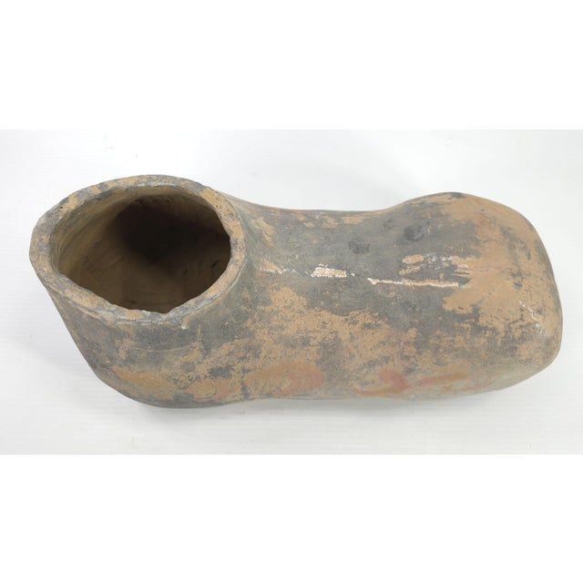 This mingqi, a funerary ceramic statue first created to be buried with the deceased to secure an enjoyable afterlife,...