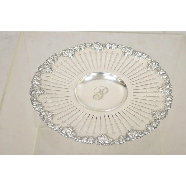 English Edwardian Grapevine Repousse Silver Plated Pierced Serving Platter. Item features "P" monogram to center, raised...