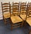 English Set of 8 Solid Cherry Ladderback Rush Seat Dining Chairs - Attributed to Pennsylvania House For Sale - Image 3 of 12