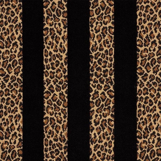 A stylish melding of epingle leopard spots and wide velvet stripes, this stunning-but-sturdy upholstery-weight fabric adds...