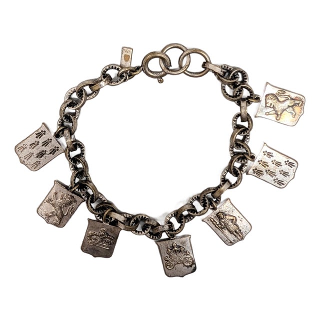 Vintage 1930s Signed Monet Silvertone Coat of Arms Charm Bracelet For Sale