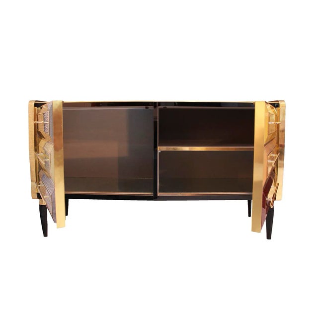 Bar cabinet consisting of 2 doors with an original structure from the 1950s made of solid wood and covered with colored...