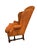 Vintage wingback chair blending classic Queen Anne elegance with iconic Archie Bunker–style comfort. Featuring a high,...