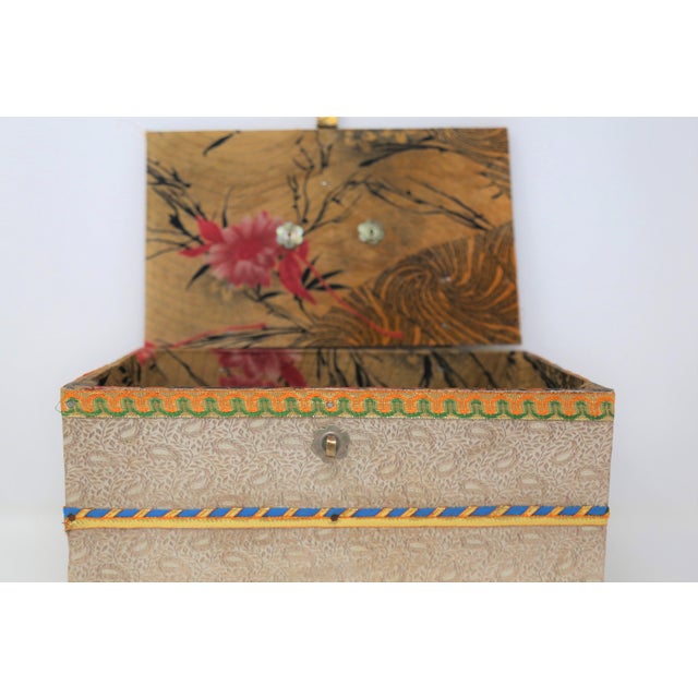Decorative Indian Hand-Painted Storage Box with Brass Latch A beautifully crafted decorative storage box featuring...