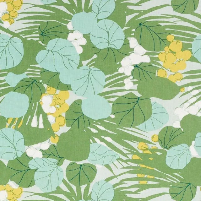 A painterly design of sea grapes and palms takes center stage in a labor-intensive screen print featuring hand-mixed inks,...
