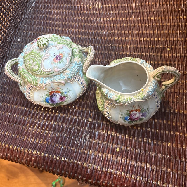 This is beautiful Japanese Moriage sugar and creamer that was made from 1840-1890 before the Country of origin law of...