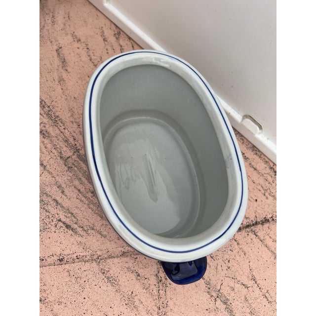 Vintage , Late 20th Century oval porcelain basin with two side handles. The planter is decorated with hand painted floral...
