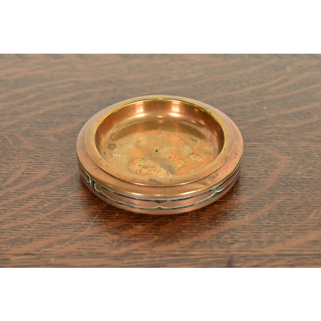A beautiful Arts & Crafts period sterling silver on bronze ashtray or catchall By Silver Crest (the mark of Smith Metal...