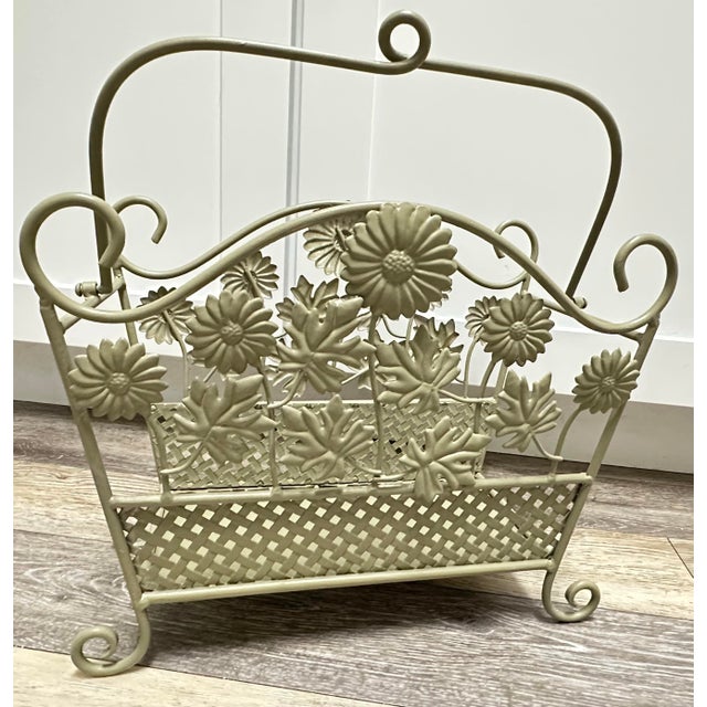 Sage green wrought-iron basket with a decorative cut out floral & basket design with a top carry handle. Handle moves....