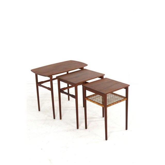 3 side tables that together form a "Nesting Tables" set; with their minimalist design, they’re a treat for the eyes and...