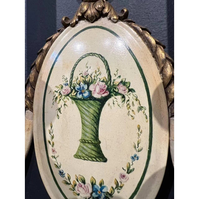 Pair of circa 1920’s Caldwell sconces with hand painted floral design and two lights