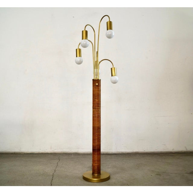 Vintage Mid century Modern floor lamp for sale. It's a beautiful lamp that is unique in style and design. It has a gold...