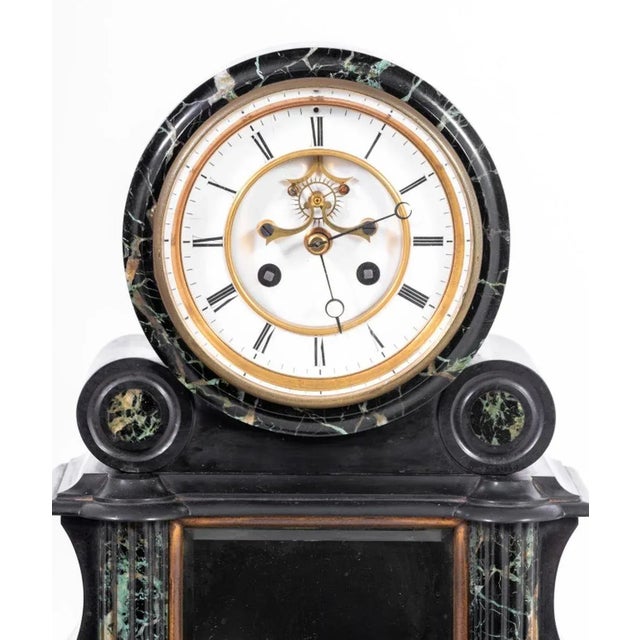 French Black Slate and Green Marble Mantel Clock, circular white enamel dial with open escapement, lacking mercury-...