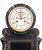 French Black Slate and Green Marble Mantel Clock, circular white enamel dial with open escapement, lacking mercury-...
