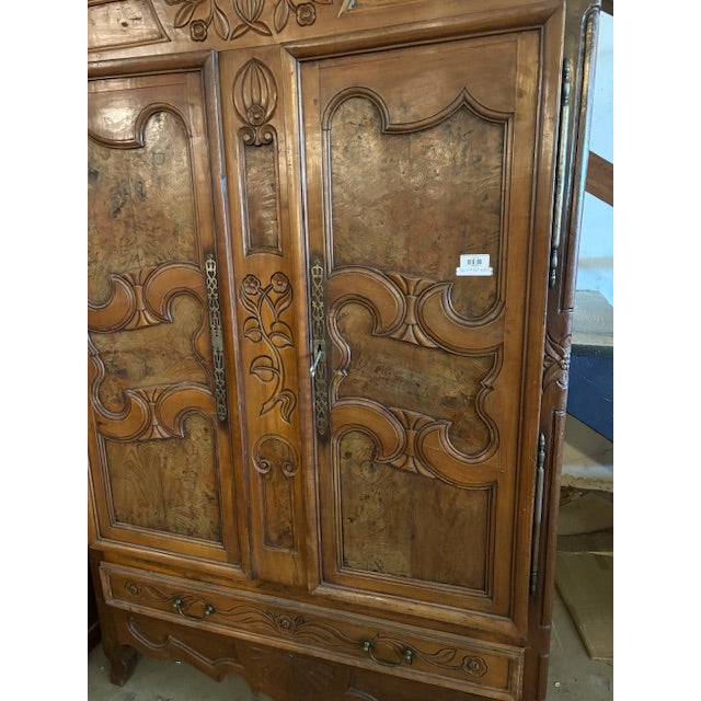 This impressive French armoire dates to the late 19th century (circa 1880–1900) and showcases the rich craftsmanship...