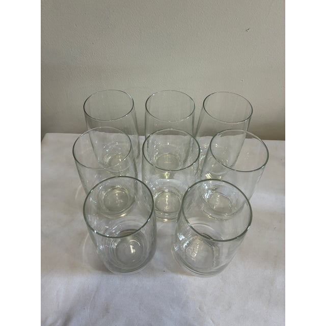 A set of eight vintage Arcoroc France Tivoli tumblers in clear glass. This classic French glassware design features a...