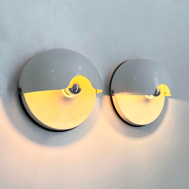 Mezzanotte Wall Lights from Guzzini, 1970s, Set of 2, in Good conditions. Designed 1970 to 1979 This piece has an...