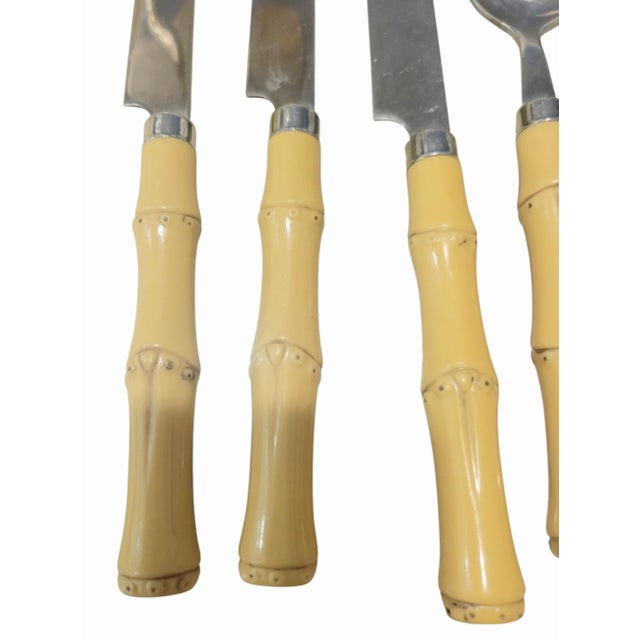 A vintage faux bamboo handle set of 13 piece flatware. This is an incomplete set. It's perfect if you already have a set...