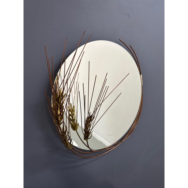 Add a touch of vintage charm to your home with this Mid Century Curtis Jere Wheat Stalk Mirror. Handcrafted and signed by...