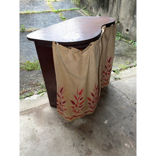 This beautifully unique mid-century style piece functions as a dressing table, entryway console, or bedroom vanity. It...