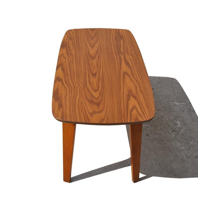 Thonet Vintage midcentury coffee table by Thonet Curved maple legs, teak laminate top. Measures: 41.5"W x 17.75" H x 10"D...