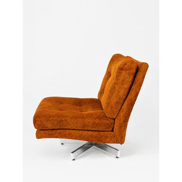 A striking pair of vintage swivel lounge chairs by Thayer Coggin, one of the most important names in American modern...