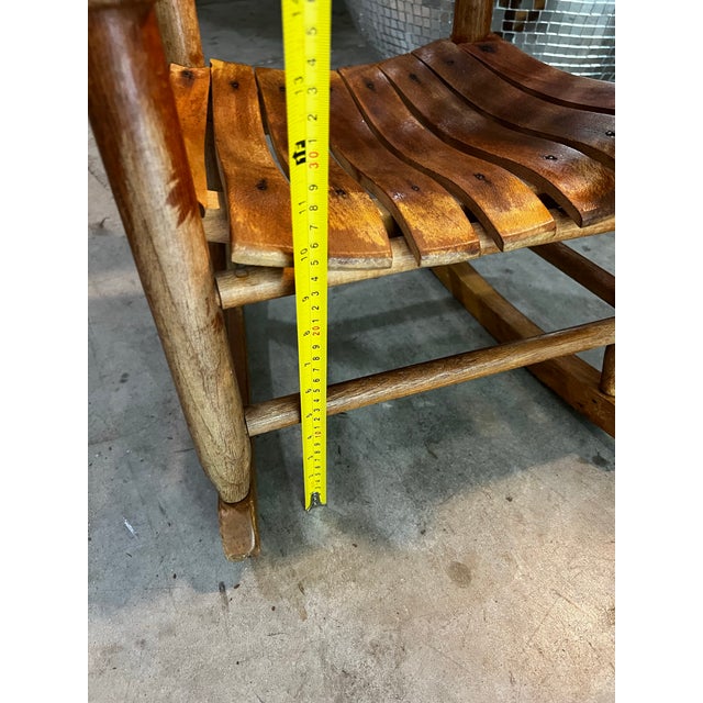 Up for consideration is a beautiful vintage children's petite wooden rocking chair. This would look lovely in your home,...