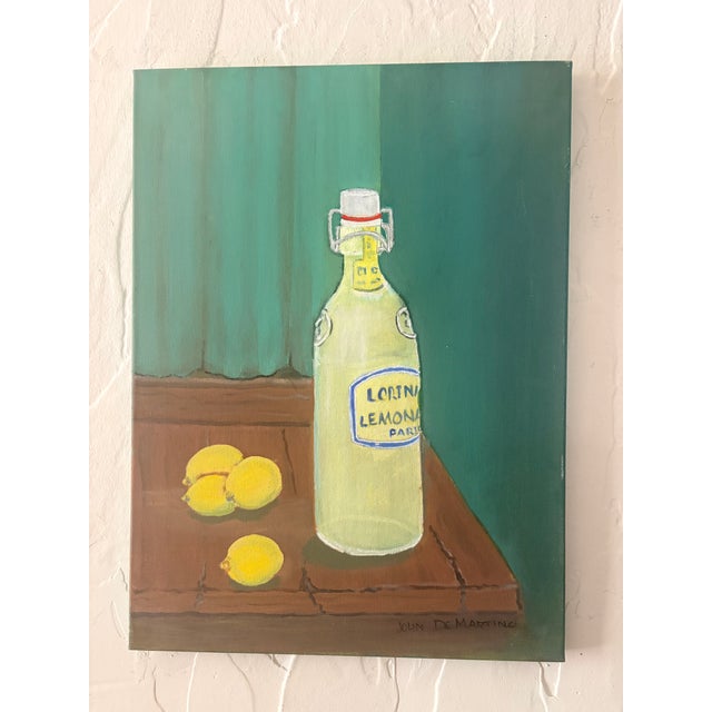 Original oil painting by John De Martino, featuring a rustic, Mediterranean-inspired still life of lemons next to a swing-...