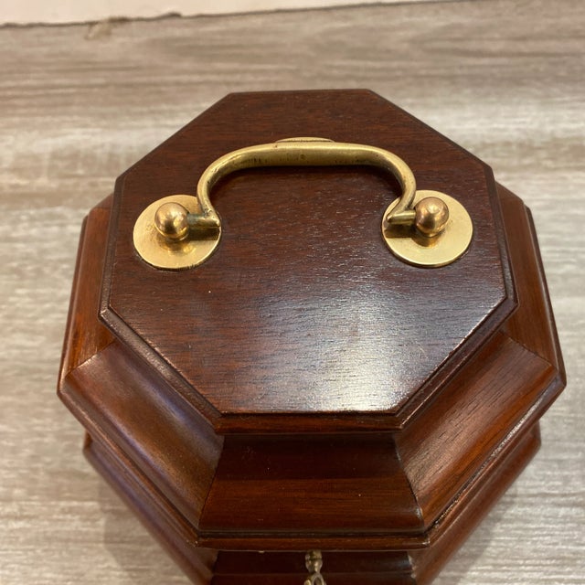 Beautifully made 8 sided mitered mahogany tea caddy with working lock and key. Marked on bottom CW 4