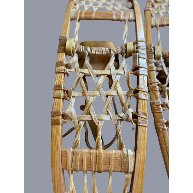 These vintage Vermont Tubbs snowshoes are a classic piece of winter outdoor gear originating from the company's production...